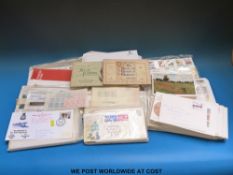 A box of first day covers including Isle of Man 1979 - 1989, Jersey 1974 -1990,