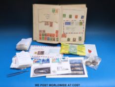 An album of stamps, loose stamps,