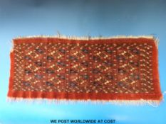 A 19thC Tekke Mafrash rug/ prayer mat in Anya or tile design (73 x 31cm)