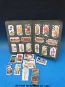 A collection of cigarette cards to include wildlife, wild flowers, first aid,