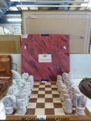 A carved stone chess set,