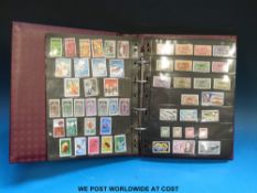 A collection of stamps from French Colonies in a binder