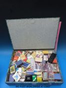 A large quantity of match box covers