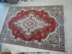 A rug with red ground (310 x 202cm)