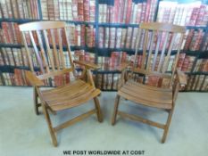 A pair of Fischer Mobel teak folding garden chairs