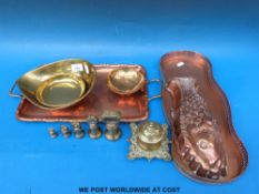 A collection of brass and copper items to include two copper trays, copper fish mould,