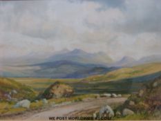 A pair of framed Irish watercolours of mountain landscapes,