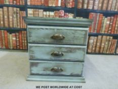 A small bedside chest of three drawers (W50 x D50 x H52cm)
