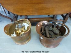 Two coal scuttles, flat irons,