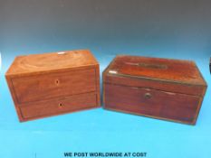 A brass bound jewellery box with brass corners and lined interiors together with another box with