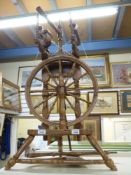 A 19thC spinning wheel with plaque Anna Siesner,