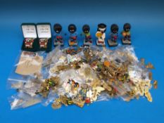 A collection of three hundred Robertson's Golly badges from the 80's and 90's,