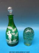 A Mary Gregory glass decanter (28cm tall) and a control bubble paperweight