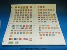 A collection of Danish stamps on loose album sheets