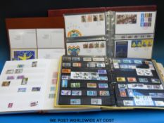 A box of GB stamps in stock books,