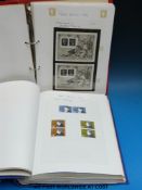 Two albums of GB stamps including many mint blocks,
