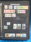 A ring binder of Commonwealth stamps including many early Canada