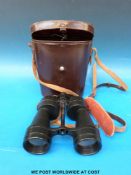 A cased pair of Ross of London Stepsun 12 x 50 binoculars in original leather case