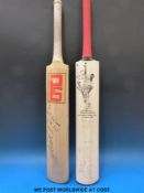 A signed cricket bat Sri Lankan touring party to England 2002 together with a further signed
