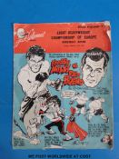 A signed and dedicated Randolph Turpin photograph together with a 1948 boxing programme with Turpin