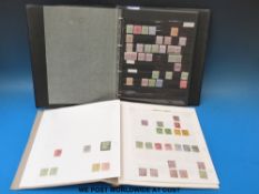 A stockbook of Gold Coast stamps, mint and used Victoria - QEII.