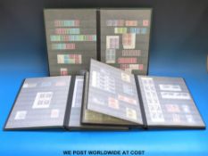 Three stock books of Great Britain stamps, George V - QEII.