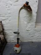 A Stihl petrol strimmer