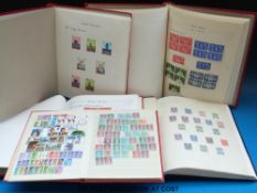 Four albums and a stockbook of GB and Channel Islands stamps Victoria -1980, mint and used.