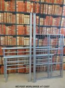 A contemporary steel tubular framed double bed in aluminium finish with pine end stops