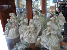 A quantity of decorative ceramic figurines