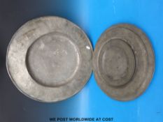 A quantity of pewter plates and chargers including 18th/19thC examples, touch marks rubbed,