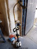 A Ryobi petrol strimmer