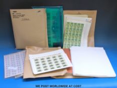 A box of all world stamps on loose album pages and stockcards,