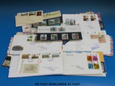 A collection of first day covers.