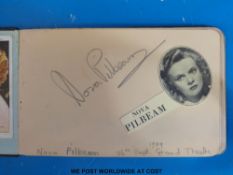 An autograph book with many autographs collected during the 1930's - 1940's to include Ivor Novello,