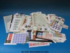 Two folders of mint GB QEII blocks and commemorative stamps,
