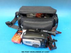 A JVC Compact VHS camcorder in carry case together with instructions and tapes