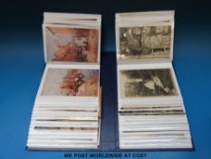 Approximately 160 postcards Edwardian onwards in two albums, largely seaside,