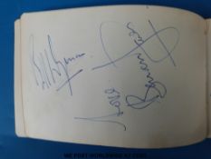 A small autograph book containing the autographs of the original Rolling Stones band members Brian