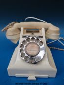 A vintage telephone in ivory colourway