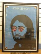 A large linen backed 1975 poster of John Lennon by Rafal Oblinski (G1945)