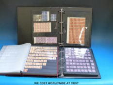 Seven stockbooks of GB QEII stamps including mint blocks