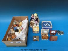 A quantity of collectable model ceramic cottages,