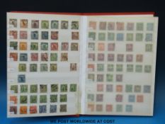 A stockbook of stamps from China including early Coiling Dragons, opts,