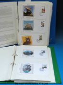 Two albums of New Zealand Benham silk first day covers (large quantity)