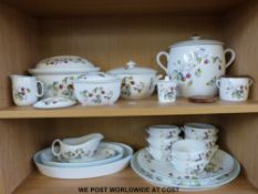 A large quantity of Royal Worcester Strawberry Fair dinner and tea ware to include casserole dish,