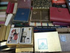 A large quantity of playing cards to include floral, transport,