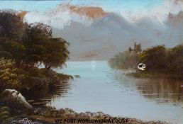 Oil on board of a loch scene in ornate gilt frame,