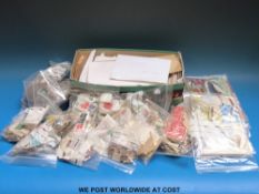 A large quantity of loose GB stamps, including many GB late Victoria - Edward VIII in packets,