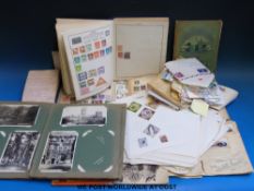 A box of sundry stamp albums and ephemera